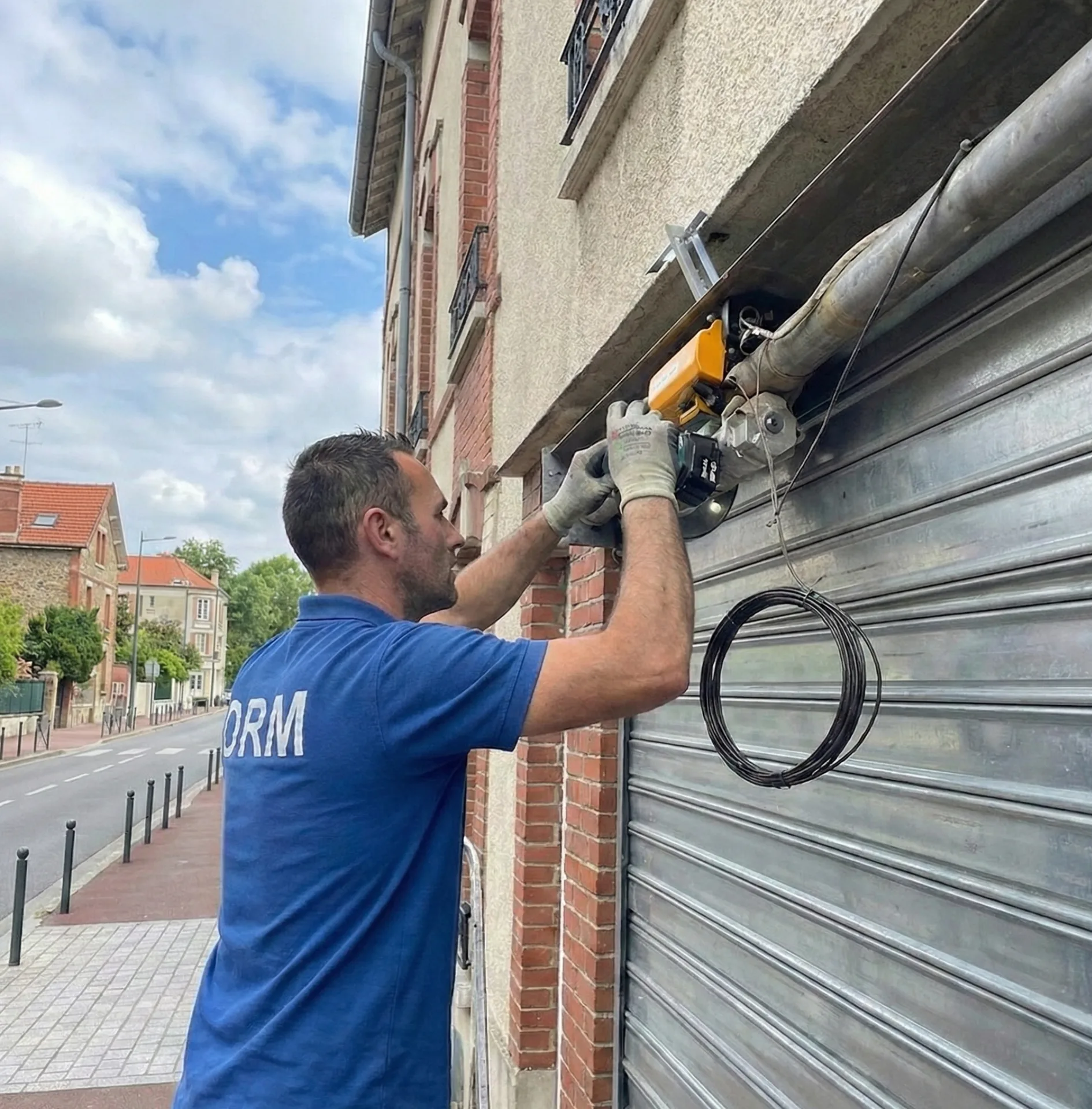 Motorisation rideau métallique — pose et remplacement — DRM expertise